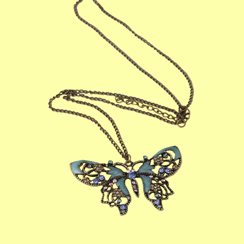 Retro hollow dripping butterfly sweater chain necklace jewelry